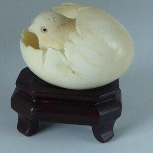 Hand Carved Asian Chick Breaking Out of Egg on Stand